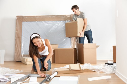 Office removal team preparing desks and equipment for a Greenwich business move