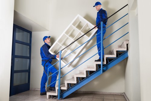 Removal team preparing a transparent quote for a Greenwich flat clearance