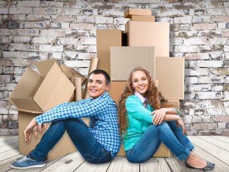 Student removals team preparing boxes for a move in Greenwich