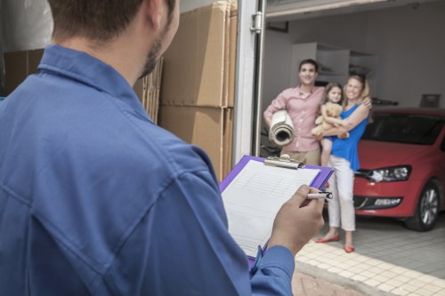 Local moving van helping with furniture and boxes in Greenwich