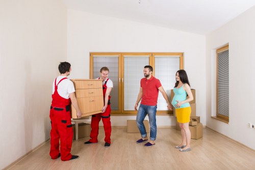 Grand piano secured for transport during a Greenwich move