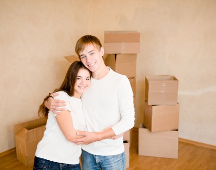 Professional movers handling packed belongings during a Greenwich relocation
