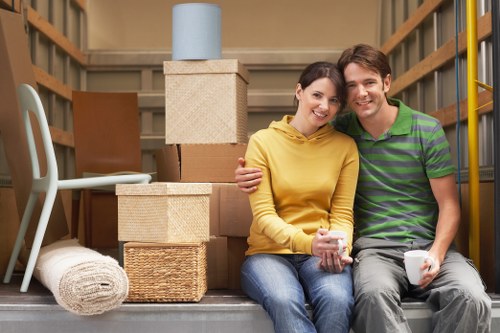 Professional flat removals in Greenwich with moving van and boxes