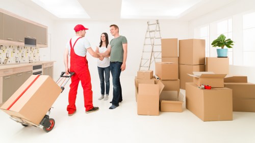 Careful handling of fragile items during packing and unpacking in Greenwich