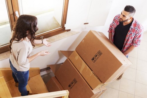 Local office movers working in a Greenwich commercial area