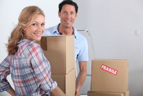 Moving furniture through a Greenwich flat with professional movers
