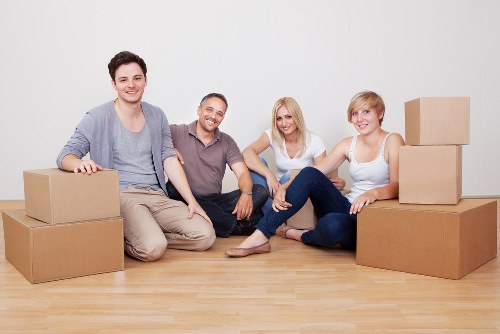 Packed boxes and furniture prepared for a local Greenwich removal van