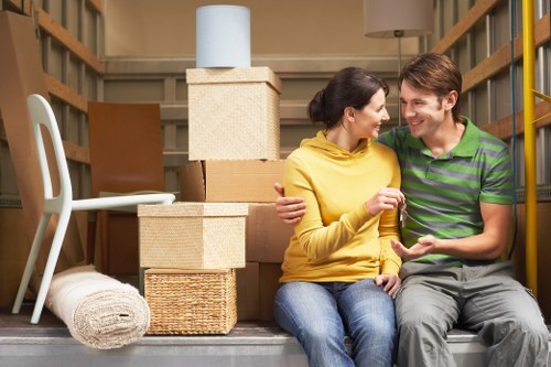Professional man and van service handling office items in Greenwich